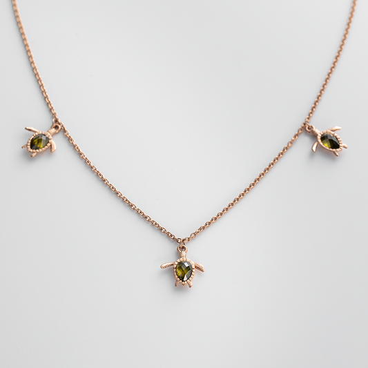 Collier tortue or rose