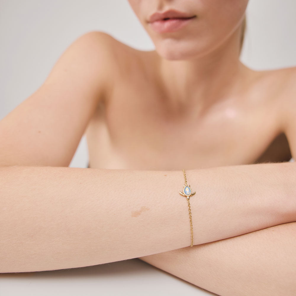 Turtle Mono Armkette White Breeze Gold