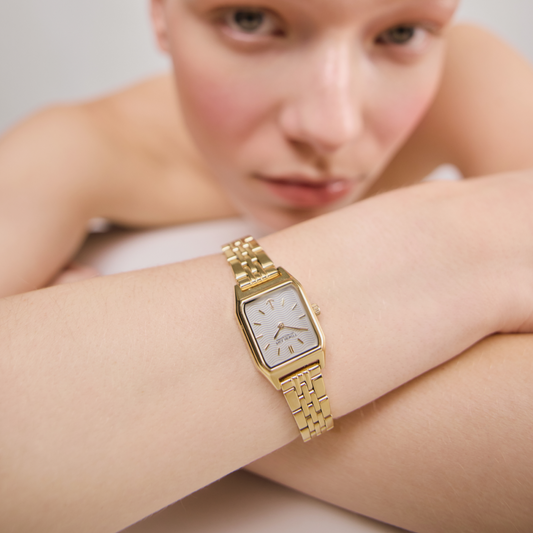 Montre Petit Soleil or blanc